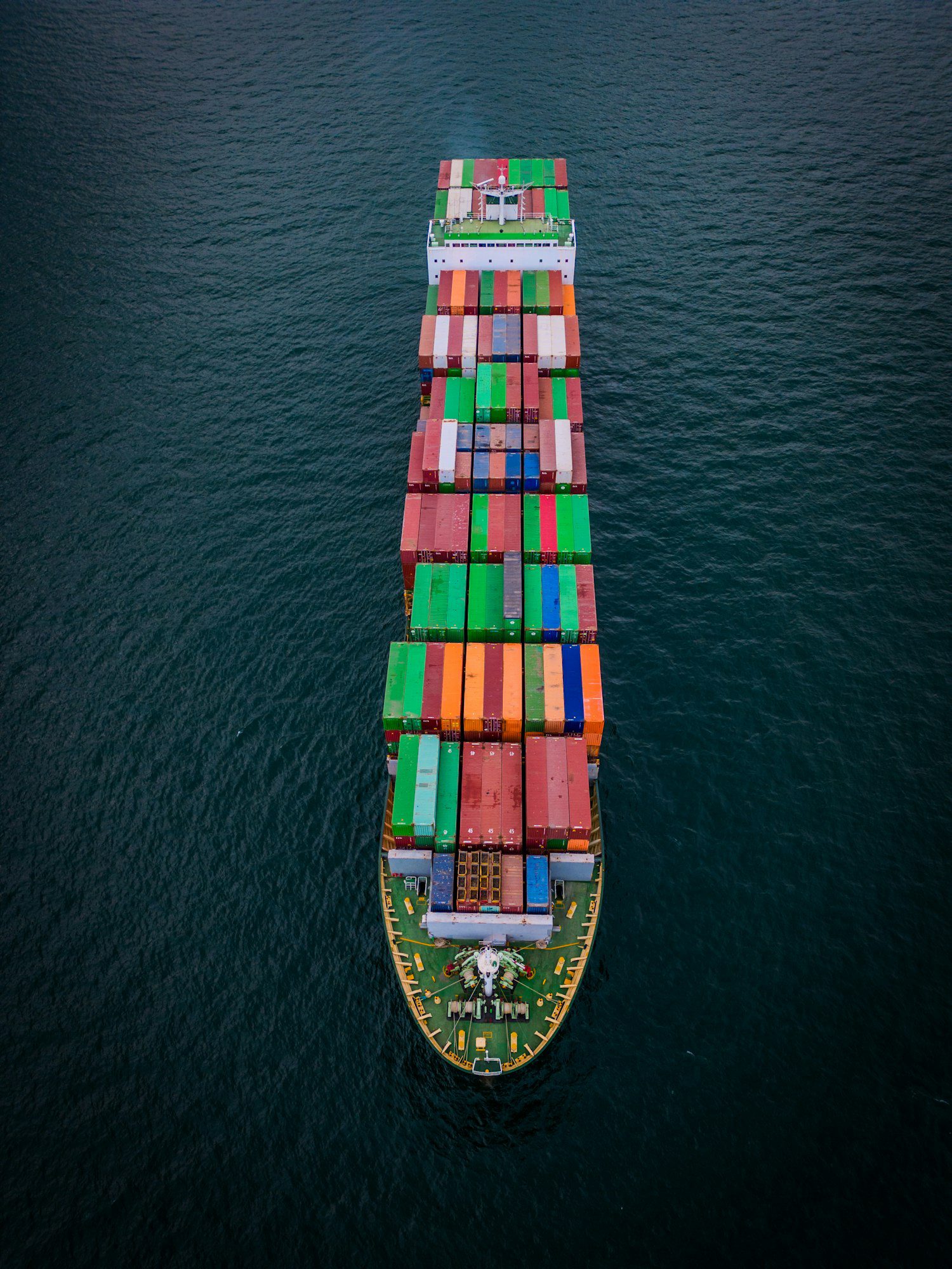 a loaded container ship in the sea aerial view concept of international trade and shipping