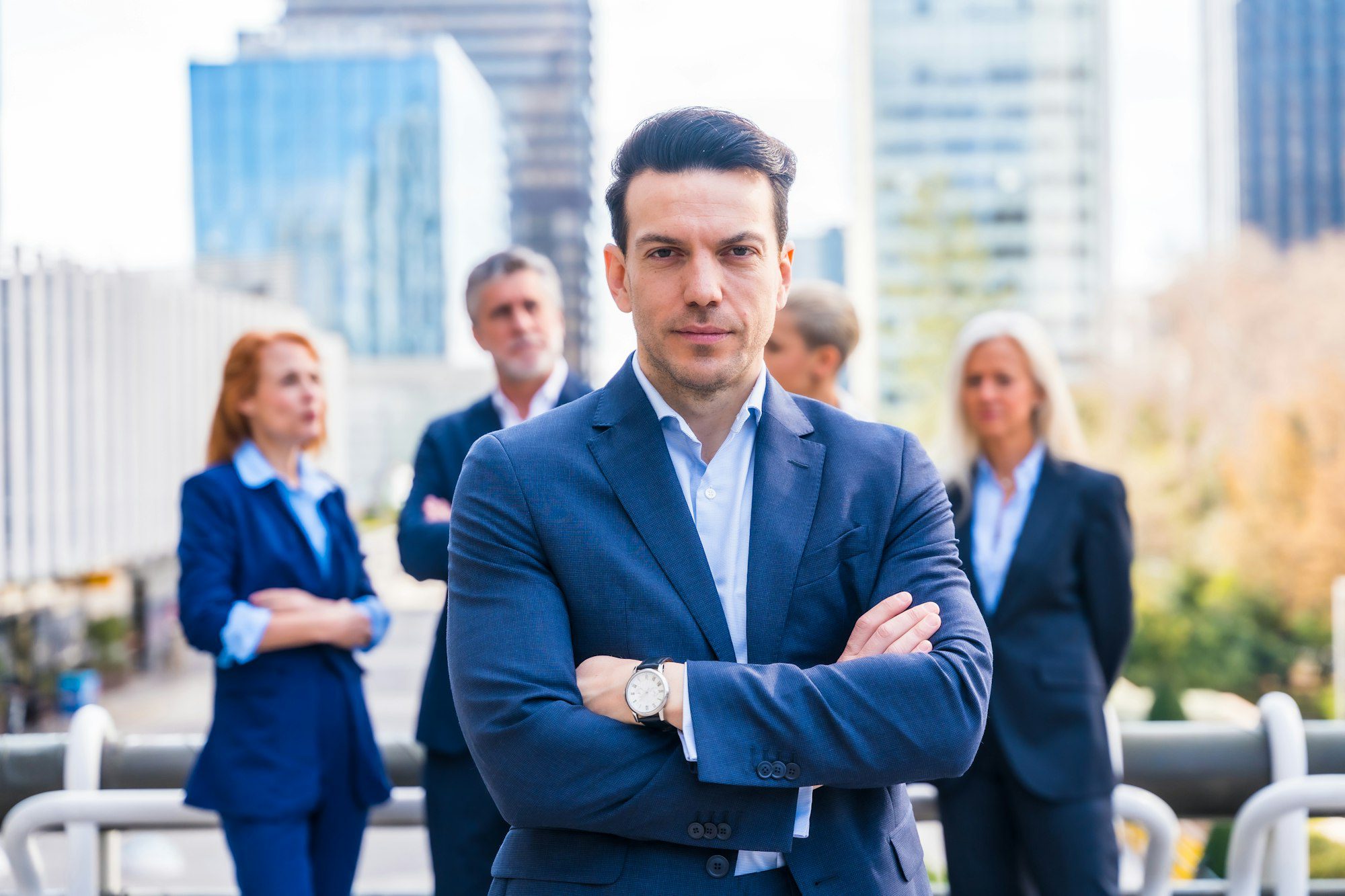 executive portrait with business team in modern commercial district